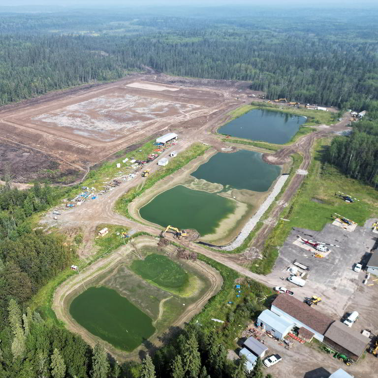 Aerial view industrial site with ponds