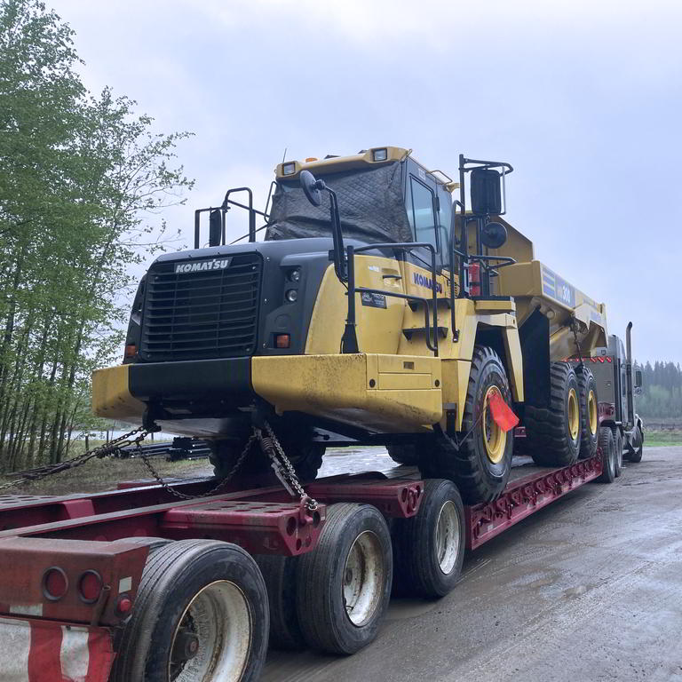 Haul truck transport on flatbed