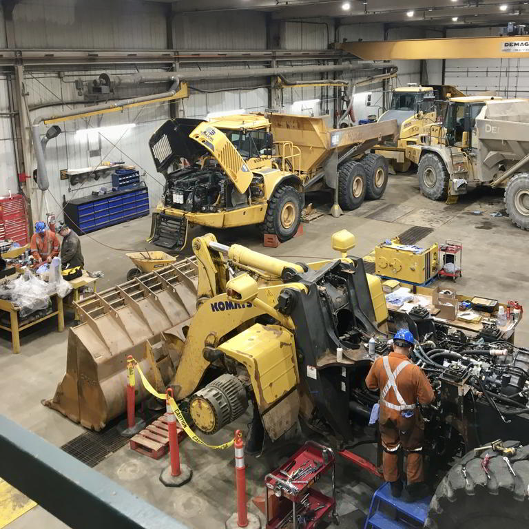 Heavy equipment repair in mechanic shop